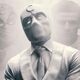 Oscar Isaac as the Mr. Knight persona in Moon Knight, with his other two personalities in the background.